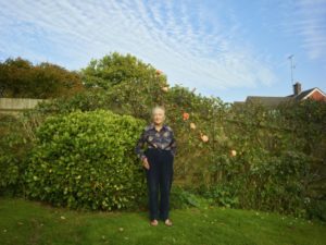 A photo of Pat in a garden